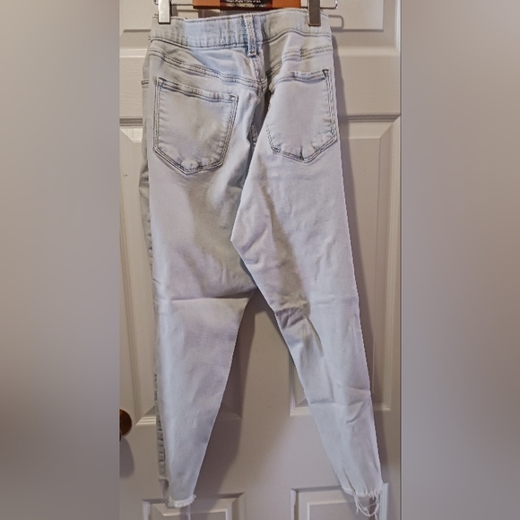 Distressed faded blue jeans - Picture 2 of 3